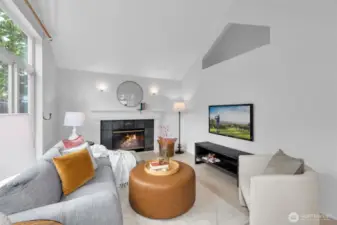 Family room featuring fireplace for cozy days. No carpet throughout the house.