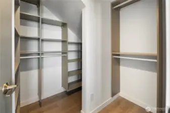 Large Walk-ins outfitted with custom California Closet Designs.