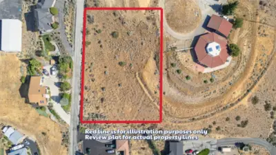 Expansive building site surrounded by natural beauty—perfect for capturing Wenatchee’s iconic sunrise and sunset skies.
