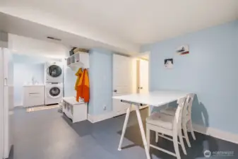 Laundry room with lots of built-in closet space!