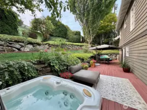 Terraced backyard with separate entrance.