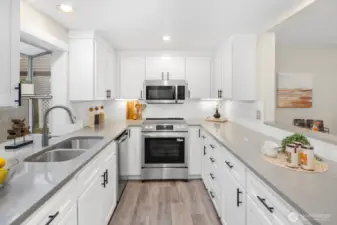 Newer cabinetry & lighting, custom tile work plus brand new fridge and range (Dec 2025).