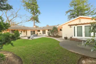 This 4-bed, 2.5-bath home offers approx. 3,300 sq ft of single-level living designed for seamless indoor/outdoor entertaining. Signature elements include cedar & fir, slate floors, floor-to-ceiling windows to harvest natural light, and wide overhangs.