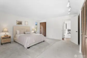 The spacious master suite with double closets & ensuite bath with shower