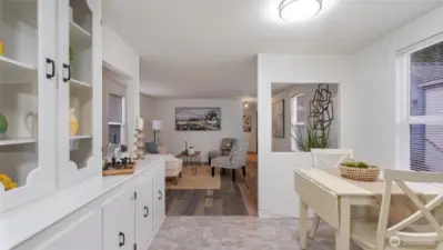 The two cutouts in the dining area creates an open and spacious feeling throughout the home