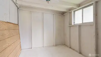 Use your imagination! This could be a storage room, Workshop or crafts room.