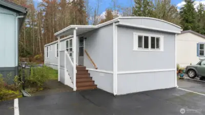 Front covered porch has all new plywood sheeting and railings