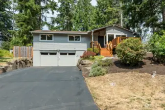 Freshly resurfaced driveway is long, keeping home set back and perched perfectly!