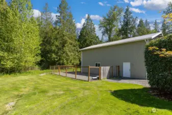 Dog run or chicken coop of this side of shop. So many options on this private parcel.