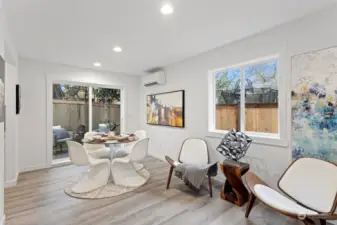 Dining area w/access to fully fenced back yard.