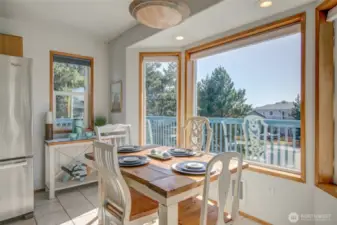 Ample dining space with peak a boo ocean view
