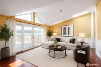 Great room with doors to access the rear deck