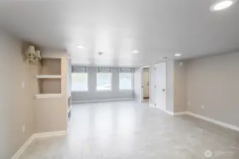 Basement living space with views of the lake and back yard