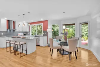 Overall view of your kitchen, eating space and access to the deck.