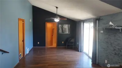 There is a ceiling fan with light fixture that was installed recently.  The floors are newer as well as the baseboard trim.