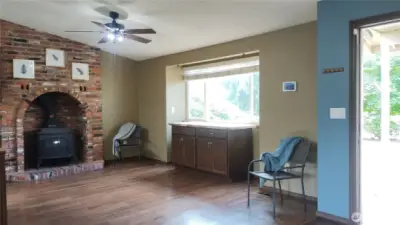 Once inside your front door, the living room with the high ceilings, opens up to the kitchen and dining room.  Notice the bay window here