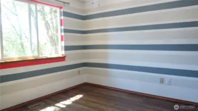 Bedroom with newer flooring-there is a ceiling fan in here too!