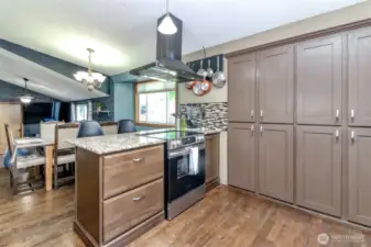 The pantry is built into the wall.  Notice the floors which as newer too!