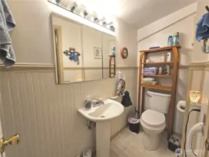 First bathroom. This is a 3/4 bath with a shower on the other side.