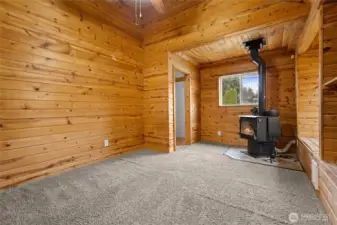 Cedar family room with wood stove