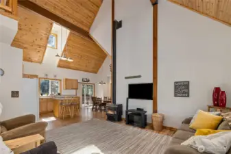 Open concept living space with soaring ceilings.