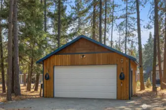 Detached garage provides ample room for storage.