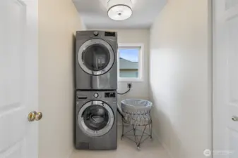 Laundry on upper level along with all 4 Bedrooms
