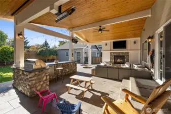 Gas fireplace & gas infrared heaters allow year round use of this incredible outdoor space