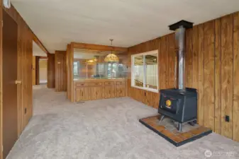 Wood stove and dining room with built in china cabinet