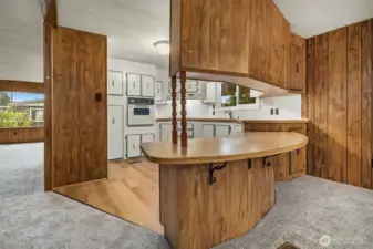 Large kitchen with eating bar and new LVP