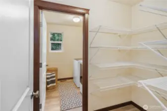 Pantry and laundry off kitchen.