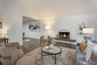 The natural wood fireplace is the perfect place to cozy up next to with a great book!