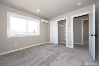 Closet in bedroom #2 has quality built-in shelves