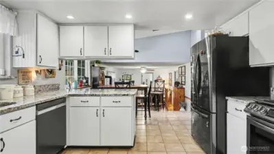 Kitchen also features stainless steel appliances and plenty of storage.