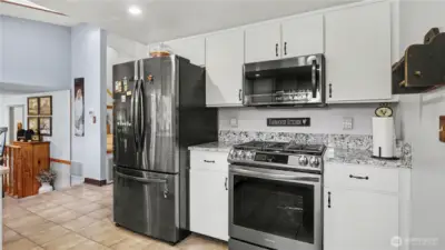 Another view of this lovely kitchen with a welcoming atmosphere.
