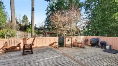 Alternate view of the private, fenced in deck designed for relaxed outdoor living.