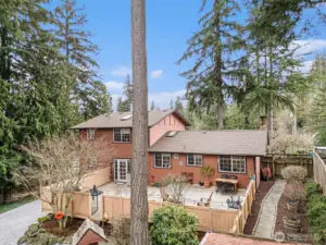 Tucked away among mature trees, offering a sense of privacy and tranquility.