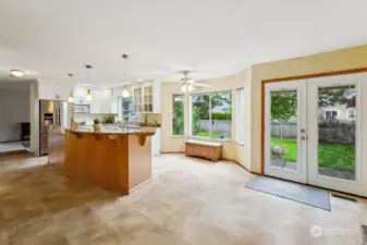 Updated Kitchen with French Doors leading to Landscaped Backyard