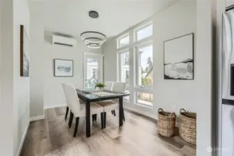 Dining room off kitchen with balcony access.