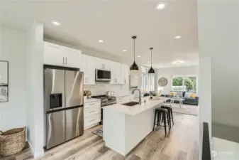 Gourmet kitchen with custom quartz counter tops.