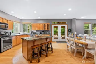 Gourmet Kitchen with doors to covered patio and outdoor entertaining space