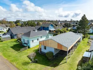 Looking Southeast.  You can see buildings of Ocean Park, WA in this drone shot.  Drive to the store in a minute, or walk if you wish.
