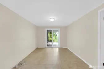 Downstairs flex space with sliding glass doors