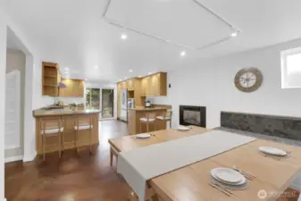 Virtually staged dining room/kitchen