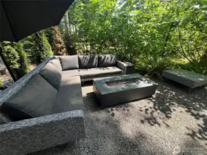 PATIO FURNITURE WITH FIRE TABLE HOOKED TO IN GROUND PROPANE TANK