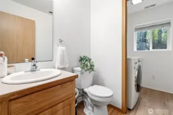Half bath off laundry room on lower level~