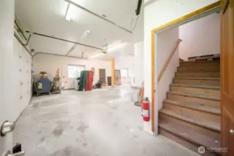 Stairs to finished studio apartment.