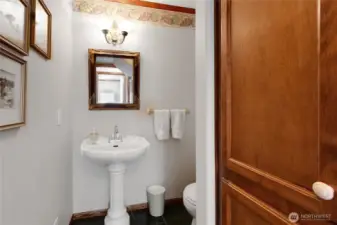 Hall half bath off Utility and office