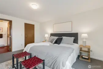 The generous primary suite is a wonderful place to retreat, with a walk-in closet & bathroom.