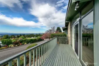 Deck off front of home wraps around side